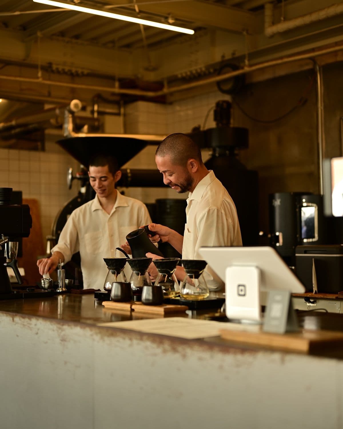 Baristas behind the counter